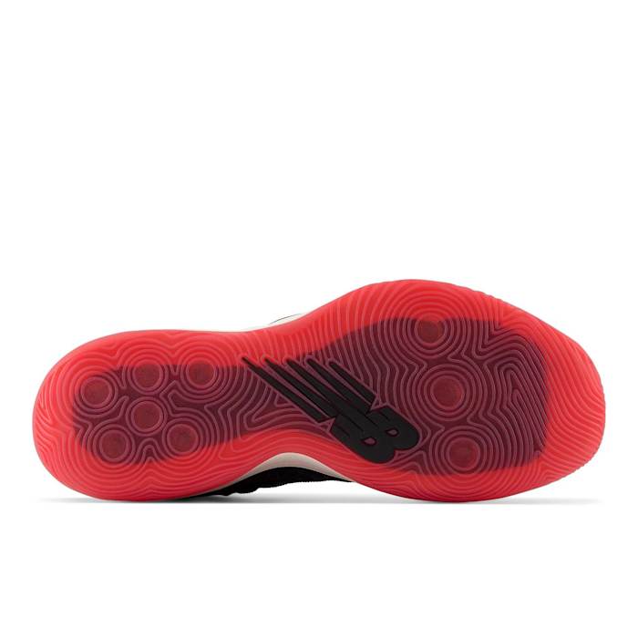Red outsole of New Balance shoe.